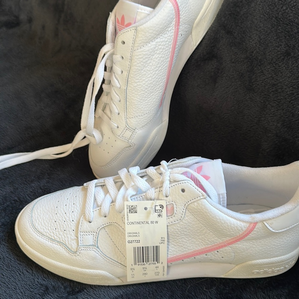 New women’s adidas shoes with pink accents